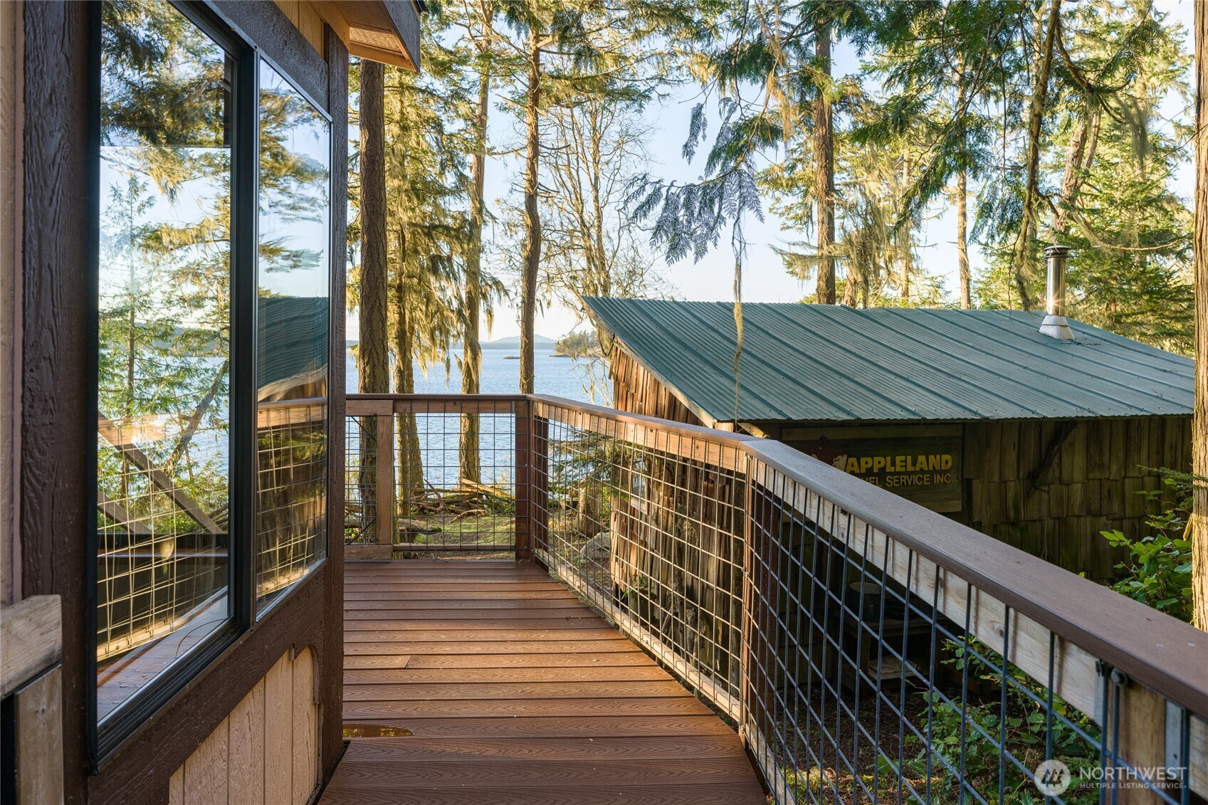 385 Doe Run Road Lopez Island, WA 98261 - Photo 25 of 31 a balcony with view of trees in front of it