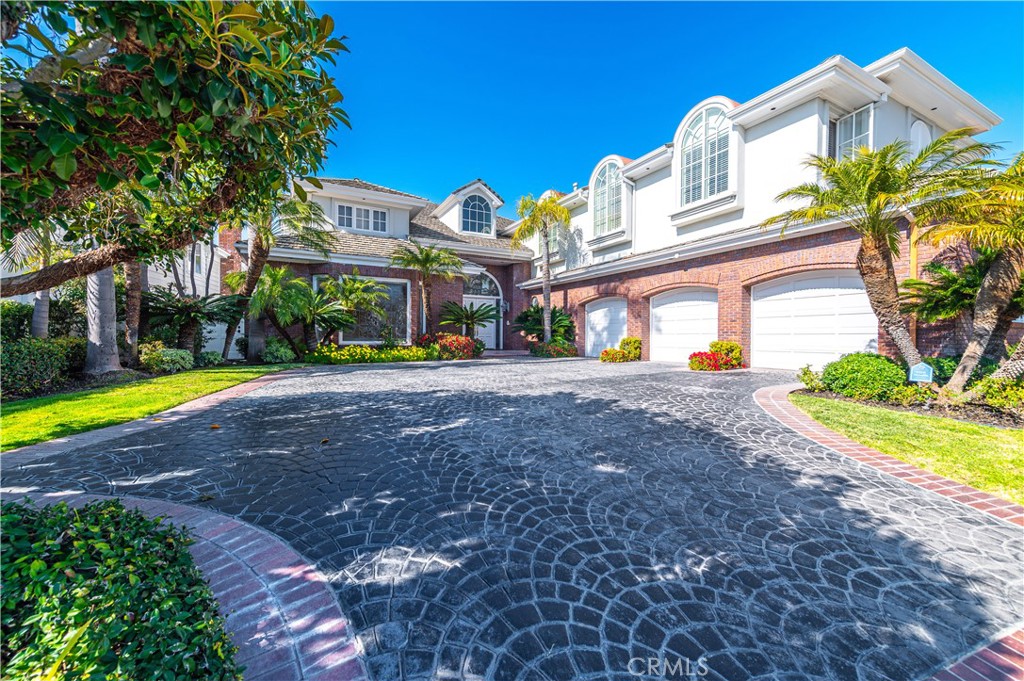 5 Sunpeak Irvine, CA 92603 - Photo 2 of 42 a front view of a house with swimming pool
