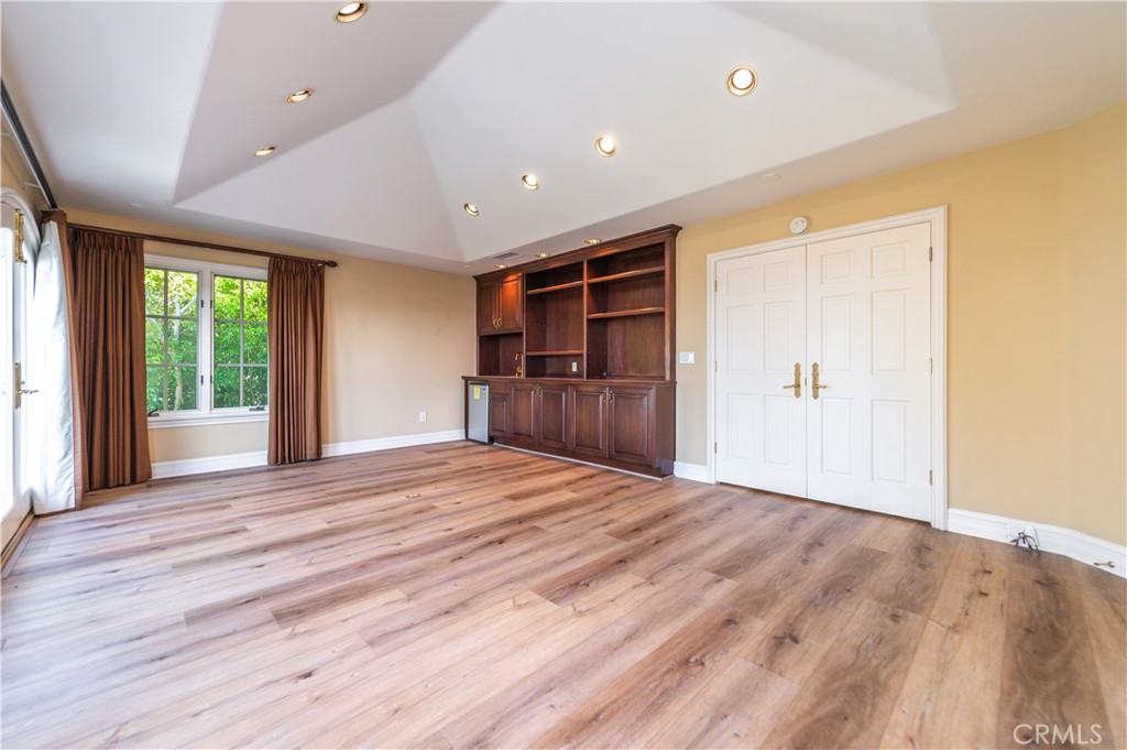 5 Sunpeak Irvine, CA 92603 - Photo 24 of 42 wooden floor in an empty room with a window