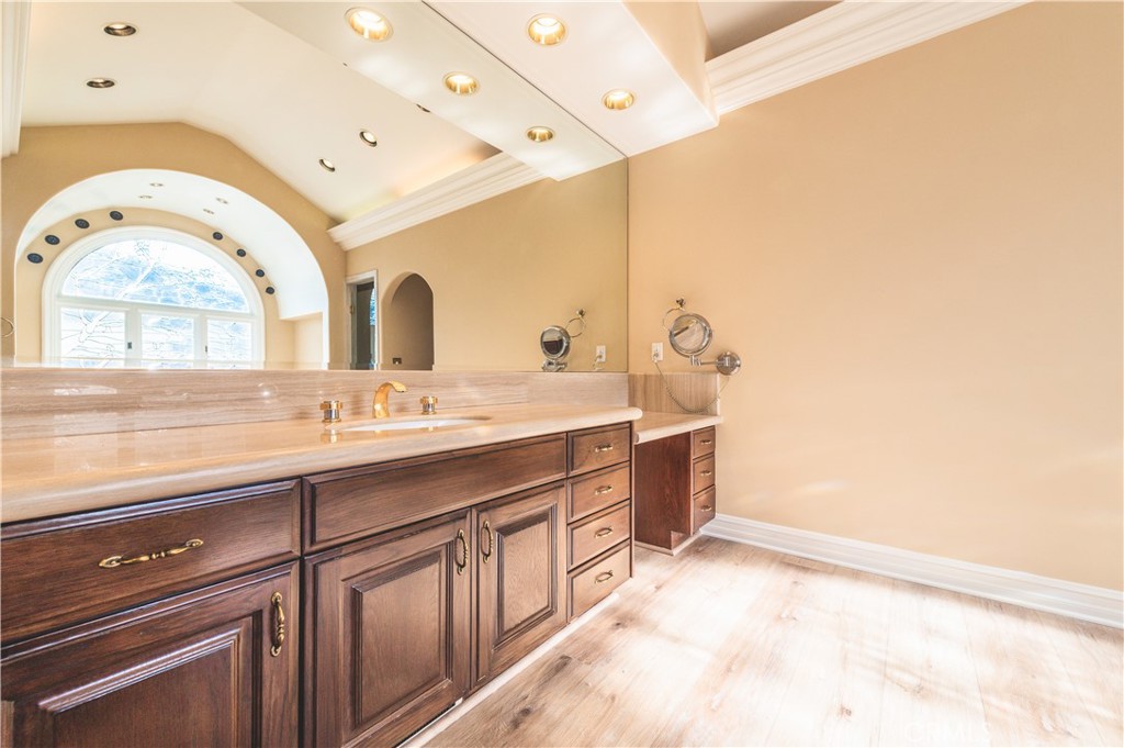 5 Sunpeak Irvine, CA 92603 - Photo 29 of 42 a spacious bathroom with a double vanity sink and a mirror