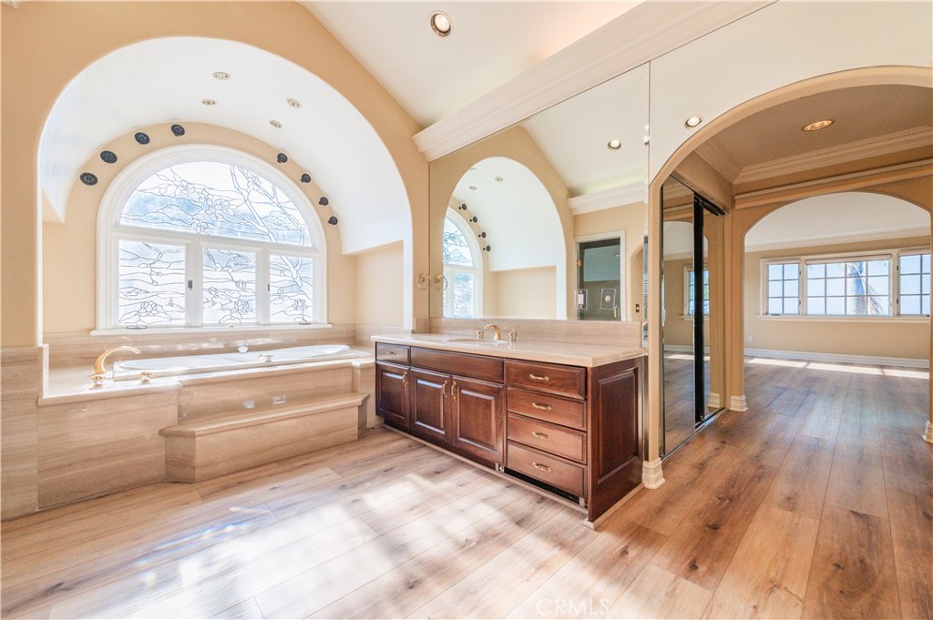 5 Sunpeak Irvine, CA 92603 - Photo 30 of 42 a large spacious bathroom with a large tub and shower