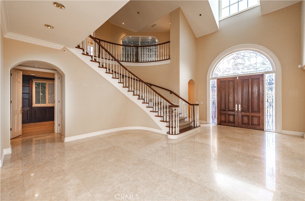 5 Sunpeak Irvine, CA 92603 - Photo 3 of 42 en view interior of a house with staircase