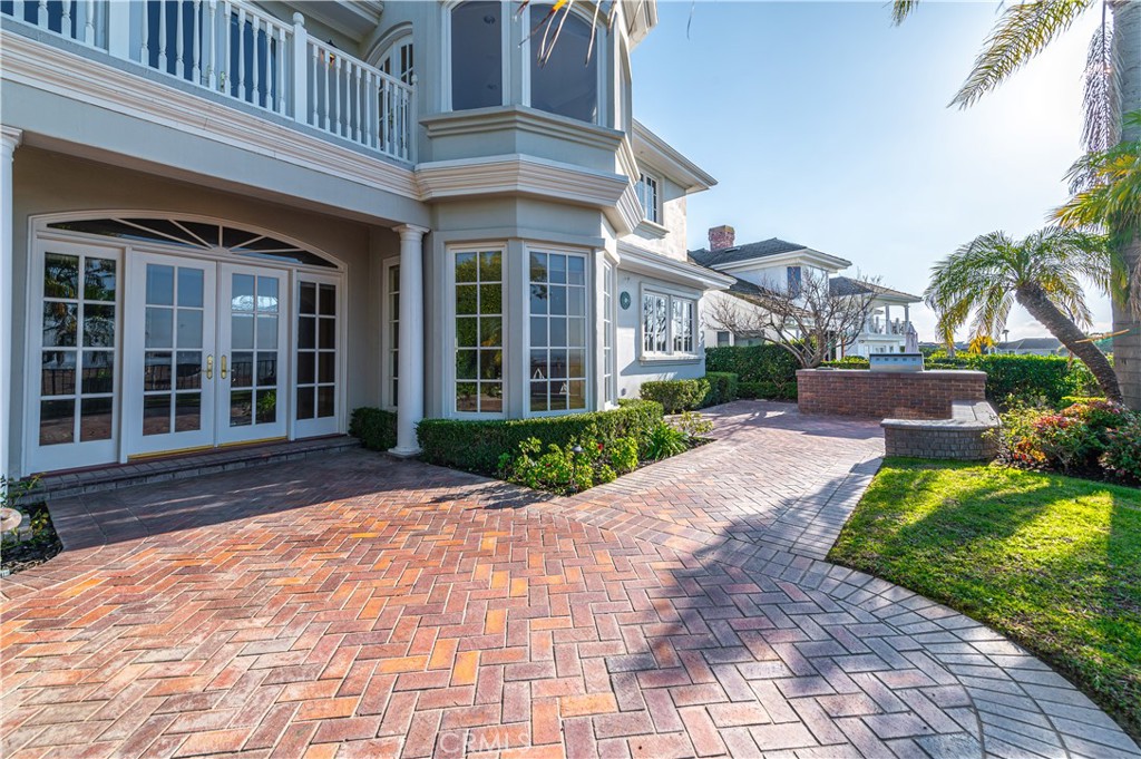 5 Sunpeak Irvine, CA 92603 - Photo 39 of 42 a front view of a house with a yard