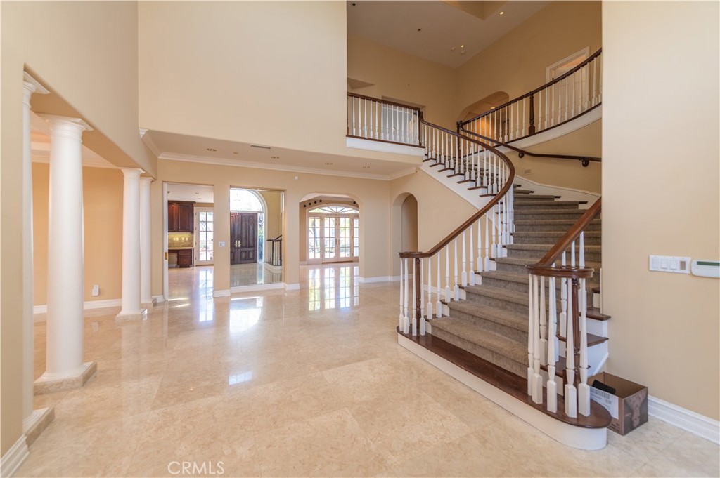 5 Sunpeak Irvine, CA 92603 - Photo 4 of 42 a view of entryway and hall with wooden floor