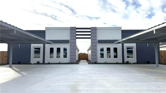 a view of a house with a garden