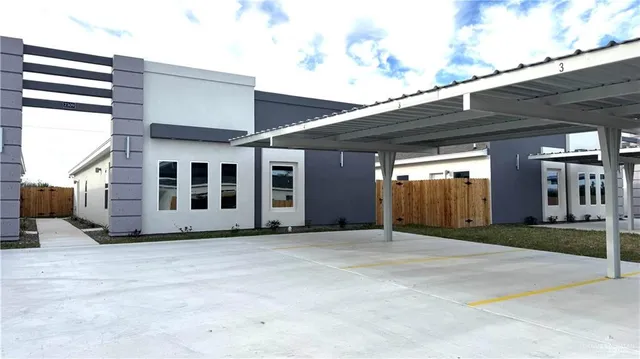 a view of porch with yard