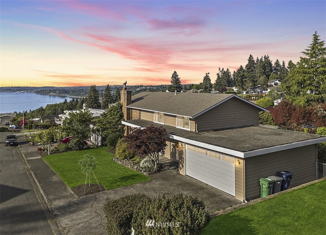 30002 2nd Avenue Southwest Federal Way, WA 98023 - Photo 1 of 34 a view of a yard in front of a house