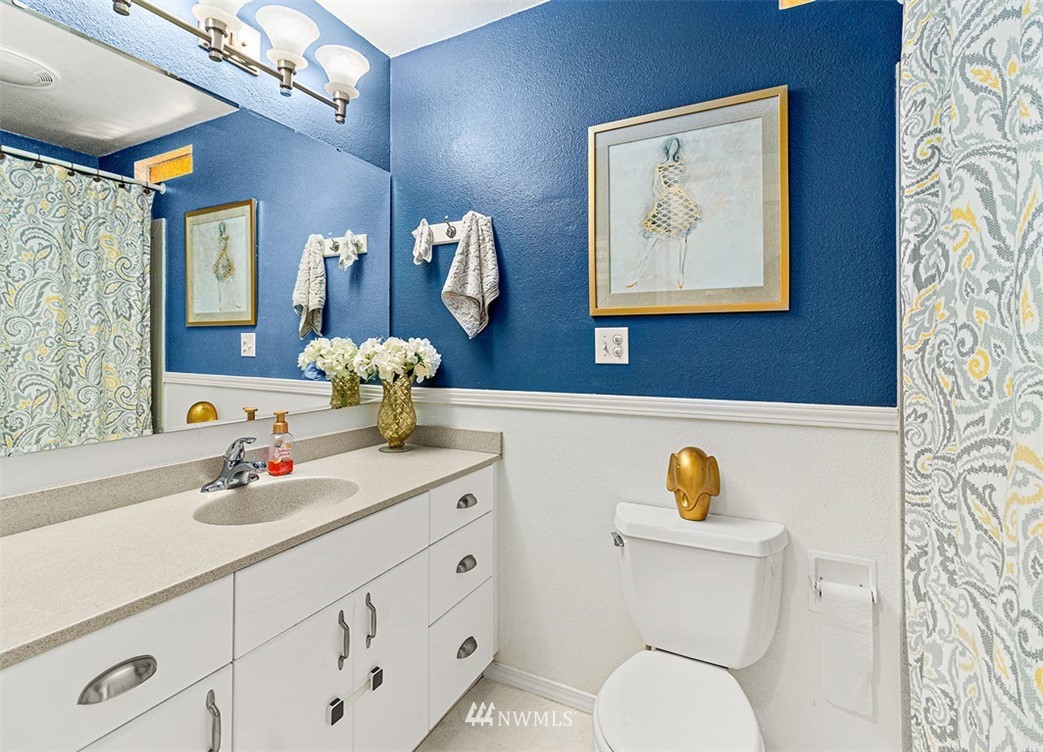 30002 2nd Avenue Southwest Federal Way, WA 98023 - Photo 13 of 34 a bathroom with a toilet sink and mirror