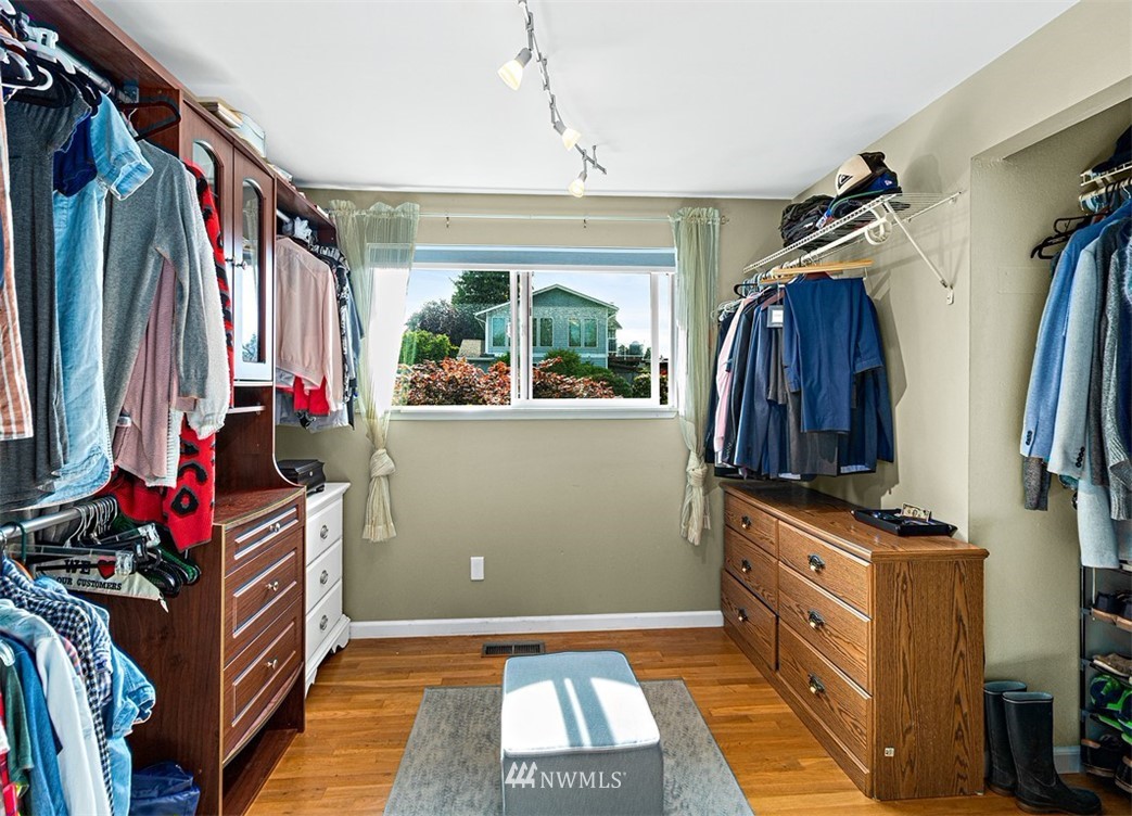 30002 2nd Avenue Southwest Federal Way, WA 98023 - Photo 18 of 34 a view of walk in closet with clothes and shoes