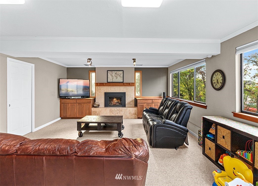 30002 2nd Avenue Southwest Federal Way, WA 98023 - Photo 21 of 34 a living room with furniture and a fireplace