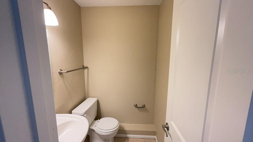 507 Northwest 39th Road, Unit 310 Gainesville, FL 32607 - Photo 18 of 18 a white toilet sitting next to a shower