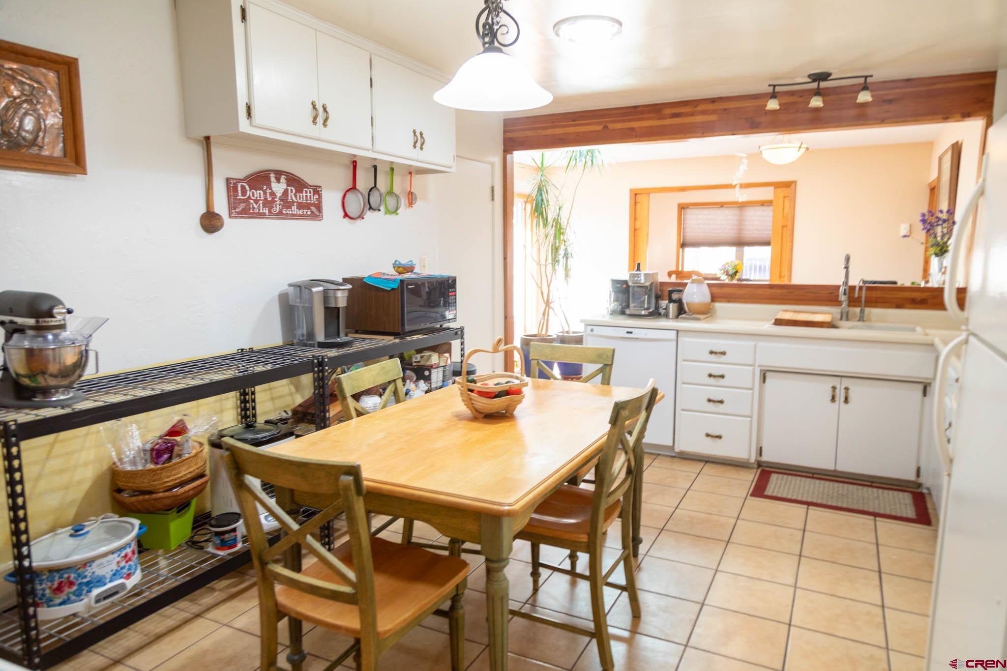 711 First Street Alamosa, CO 81101 - Photo 21 of 21 a view of a kitchen and dining room
