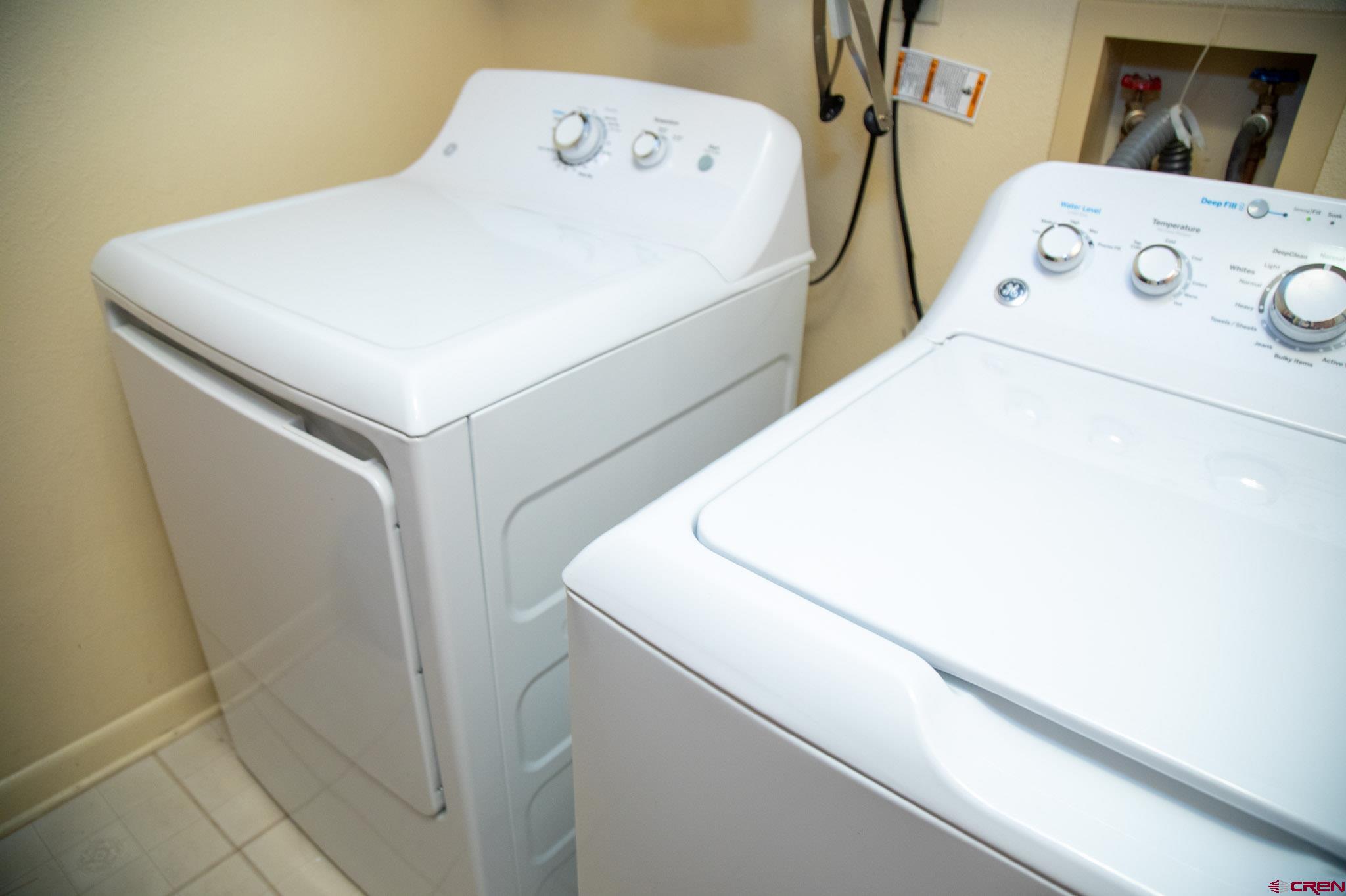 711 First Street Alamosa, CO 81101 - Photo 7 of 21 a utility room with dryer and washer