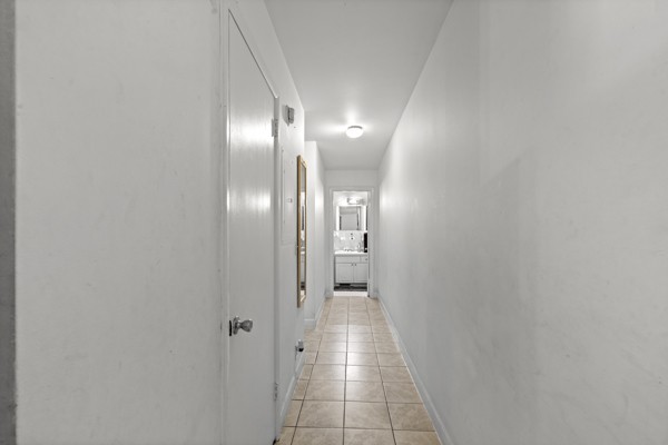 613 Hillsboro Road, Unit B17 Franklin, TN 37064 - Photo 14 of 27 a view of a hallway with wooden floor