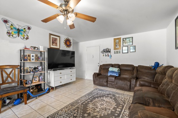 613 Hillsboro Road, Unit B17 Franklin, TN 37064 - Photo 7 of 27 a living room with furniture and a flat screen tv