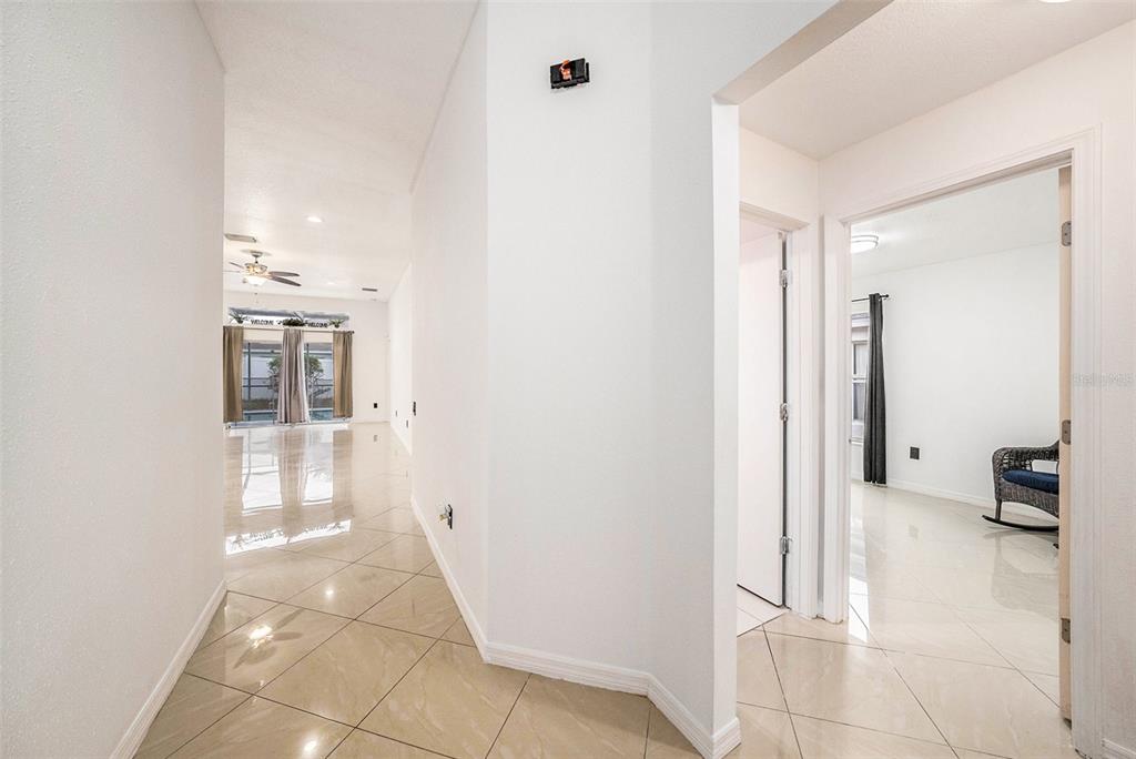 5644 Grindstone Loop Wesley Chapel, FL 33544 - Photo 5 of 29 a view of a hallway