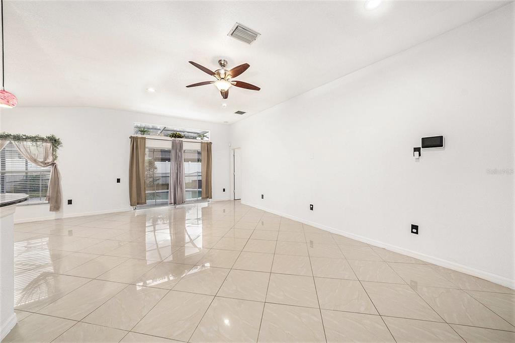 5644 Grindstone Loop Wesley Chapel, FL 33544 - Photo 7 of 29 a view of an empty room