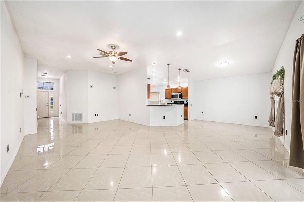 5644 Grindstone Loop Wesley Chapel, FL 33544 - Photo 8 of 29 a view of a kitchen with electric appliances