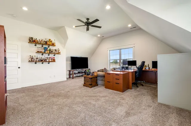 a view of a livingroom with furniture
