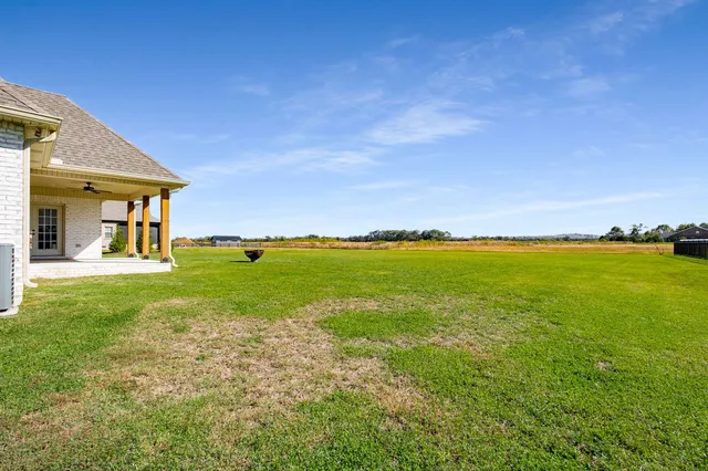 a view of a ocean from a yard