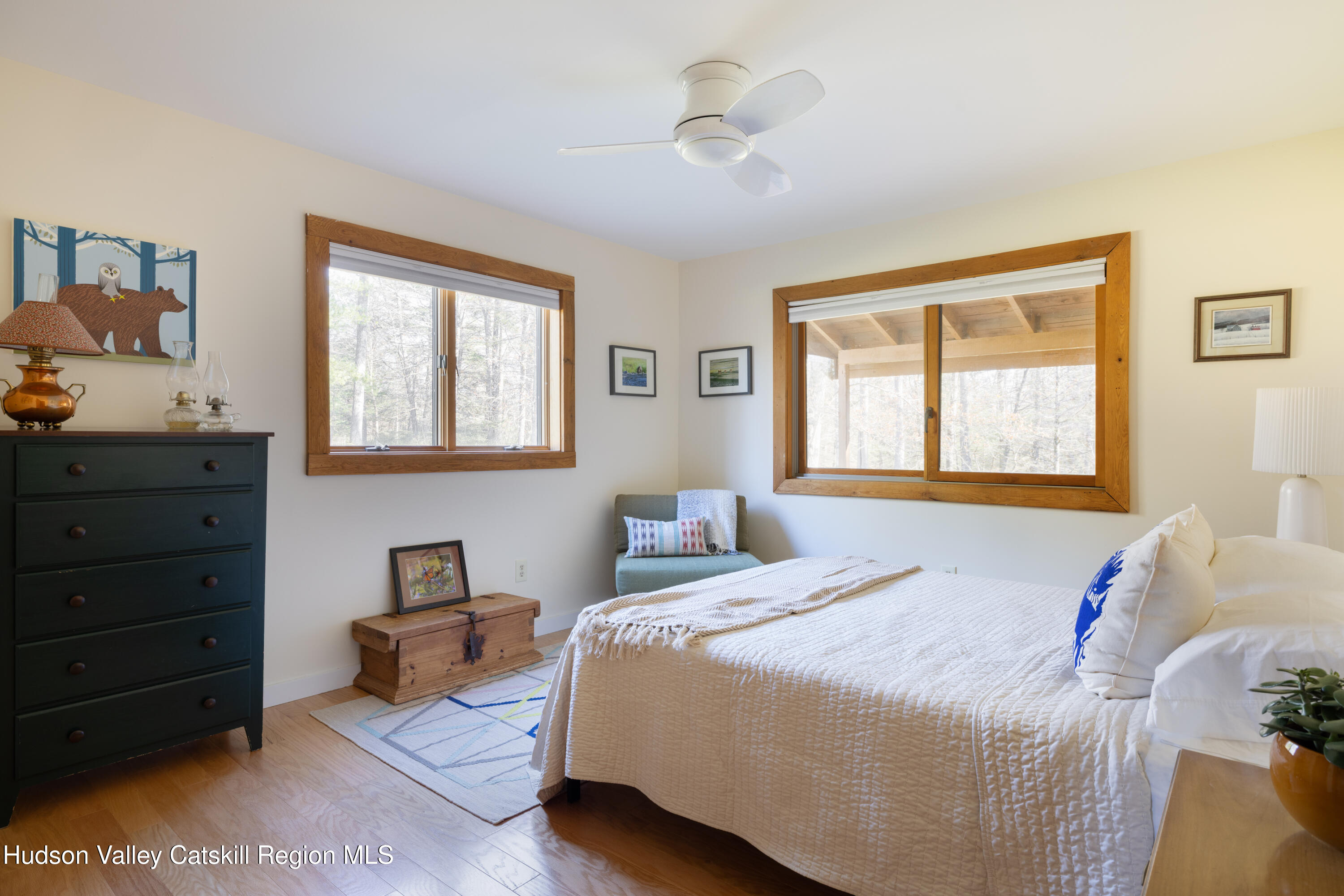 827 Ashokan Road Kingston, NY 12401 - Photo 15 of 36 a bedroom with a bed and wooden floor