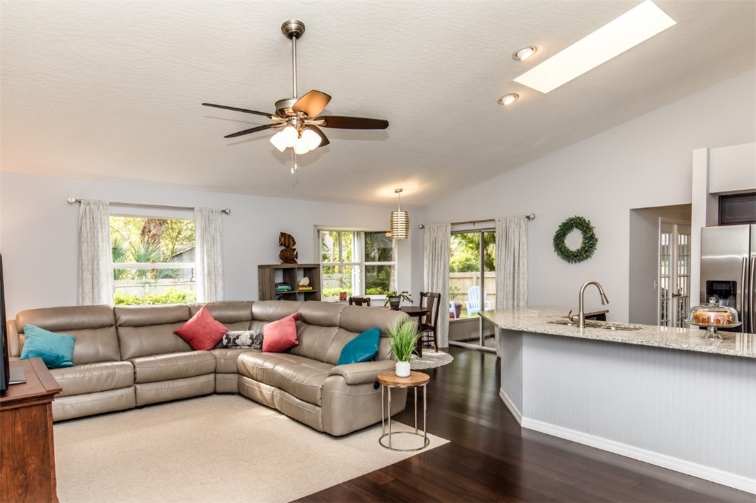 168 Midvale Terrace Sebastian, FL 32958 - Photo 14 of 25 a living room with furniture kitchen view and a window