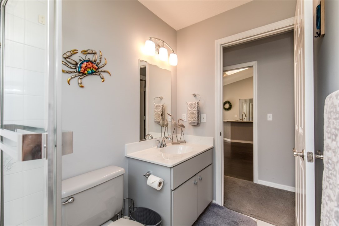 168 Midvale Terrace Sebastian, FL 32958 - Photo 19 of 25 a bathroom with a sink a vanity and a mirror