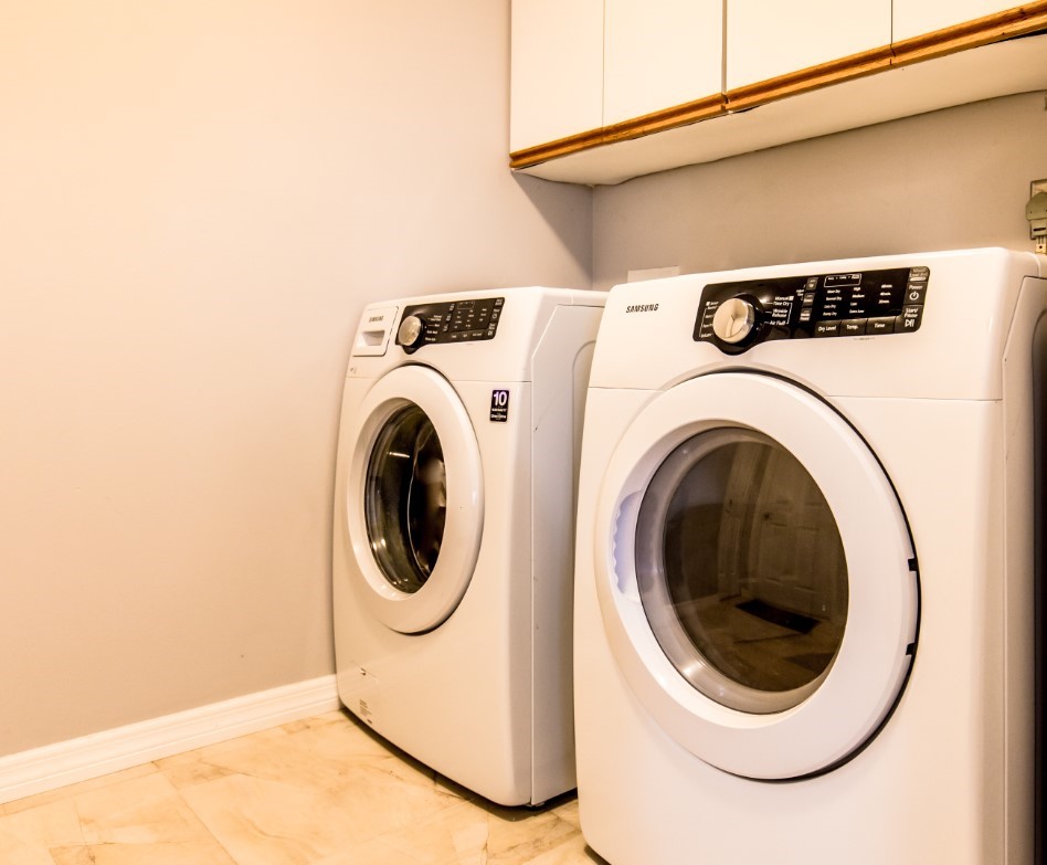 168 Midvale Terrace Sebastian, FL 32958 - Photo 22 of 25 a utility room with dryer and washer