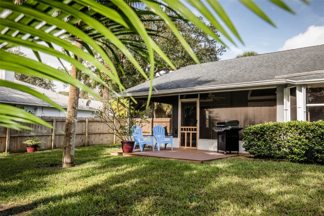 168 Midvale Terrace Sebastian, FL 32958 - Photo 23 of 25 a view of a house with backyard porch and sitting area