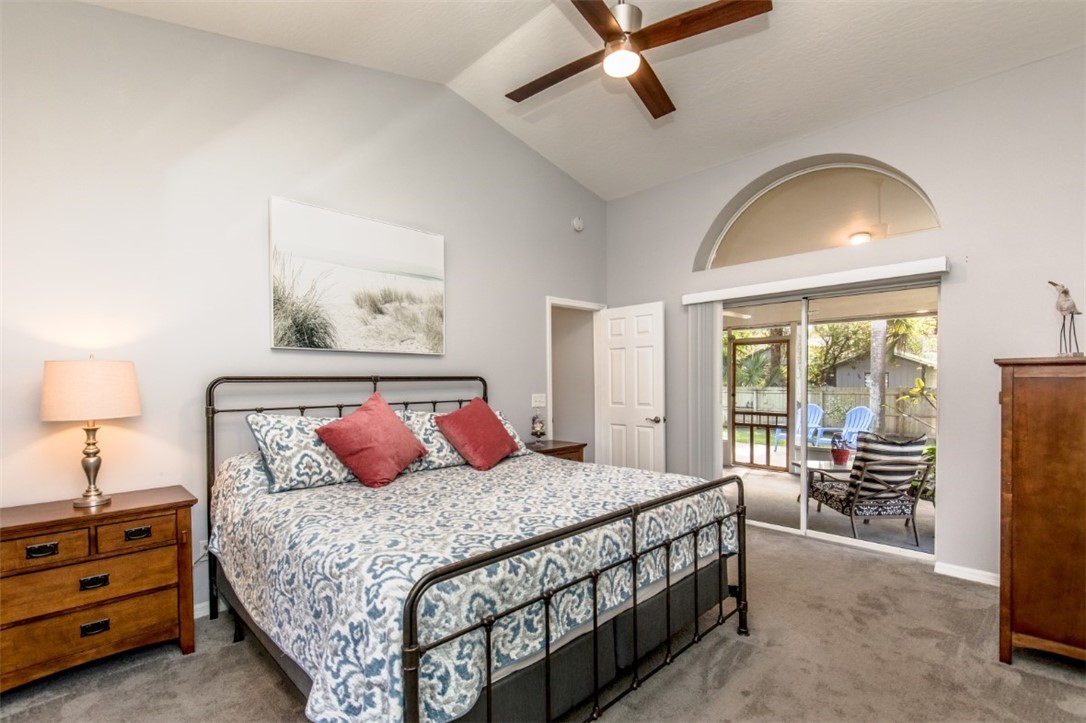 168 Midvale Terrace Sebastian, FL 32958 - Photo 9 of 25 a bedroom with a bed and a dresser