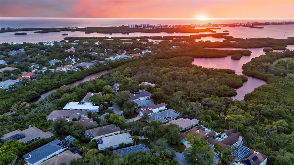 156 Bishopscourt Road Osprey, FL 34229 - Photo 2 of 84 an aerial view of lake and city
