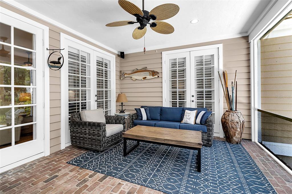 156 Bishopscourt Road Osprey, FL 34229 - Photo 27 of 84 a living room with furniture and a window