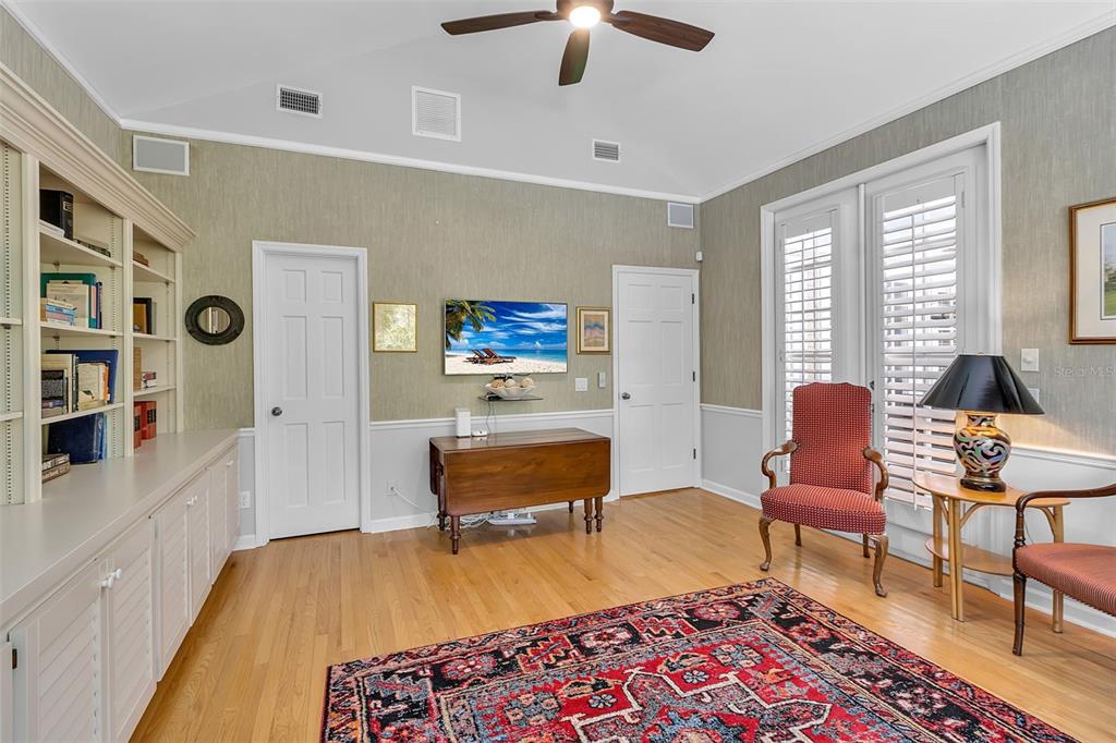 156 Bishopscourt Road Osprey, FL 34229 - Photo 49 of 84 a living room with furniture and a rug