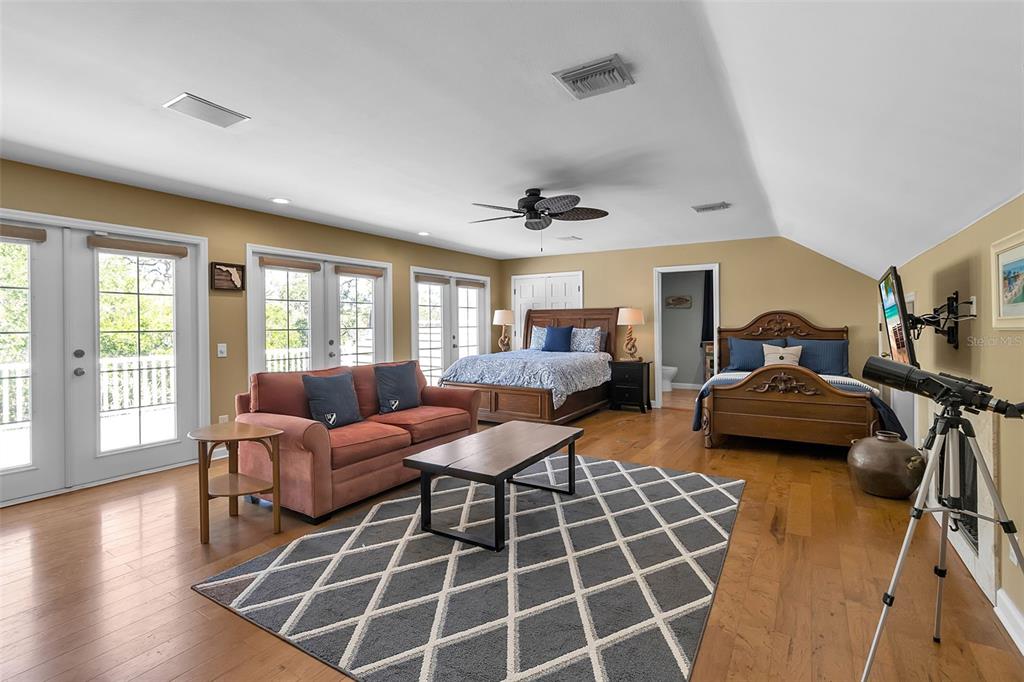 156 Bishopscourt Road Osprey, FL 34229 - Photo 55 of 84 a bedroom with furniture and a window