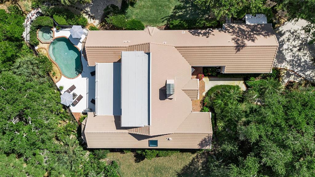 156 Bishopscourt Road Osprey, FL 34229 - Photo 10 of 84 an aerial view of a house with a yard