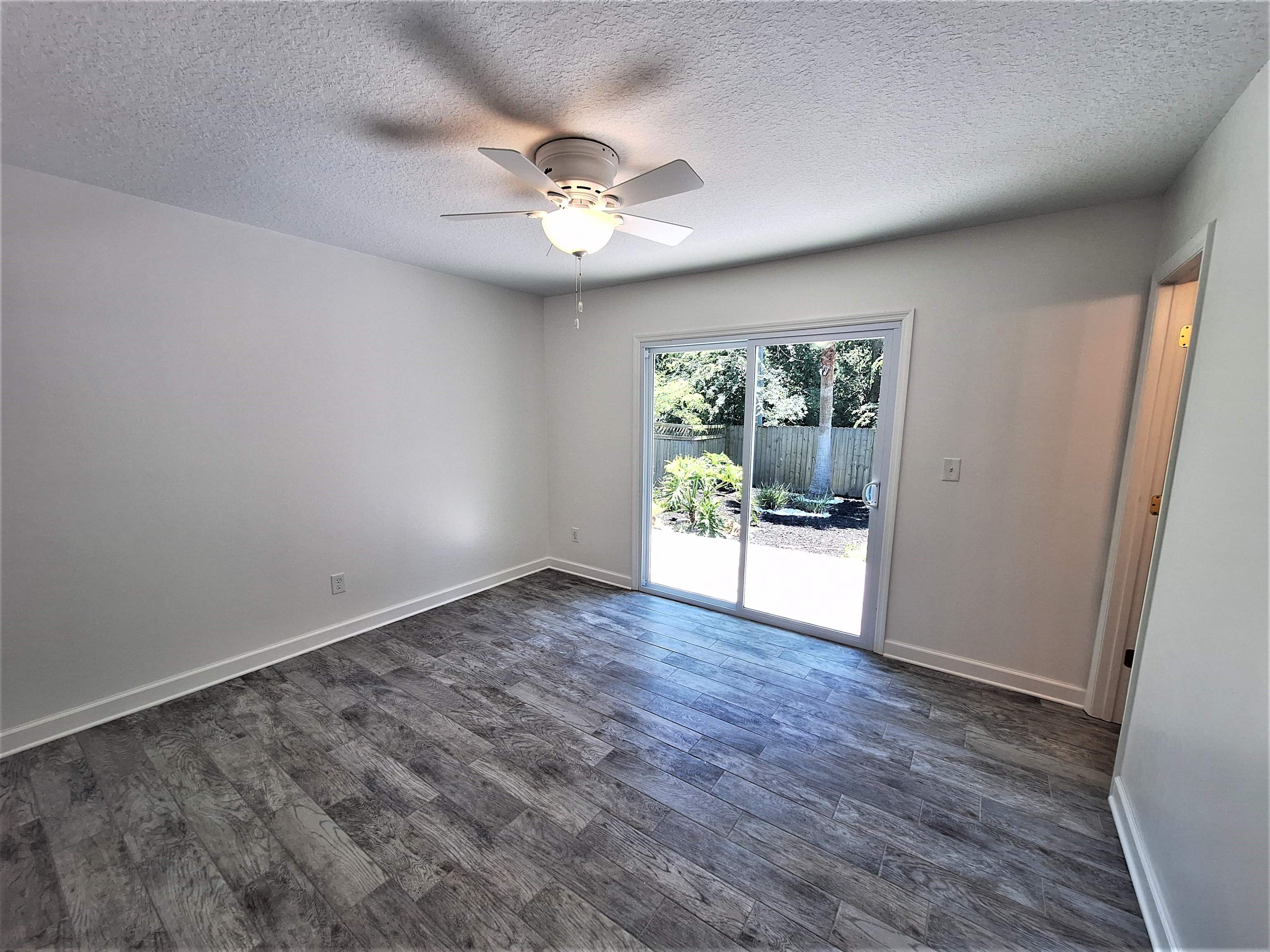 129 15th Street St. Augustine, FL 32080 - Photo 25 of 61 a view of an empty room with a window