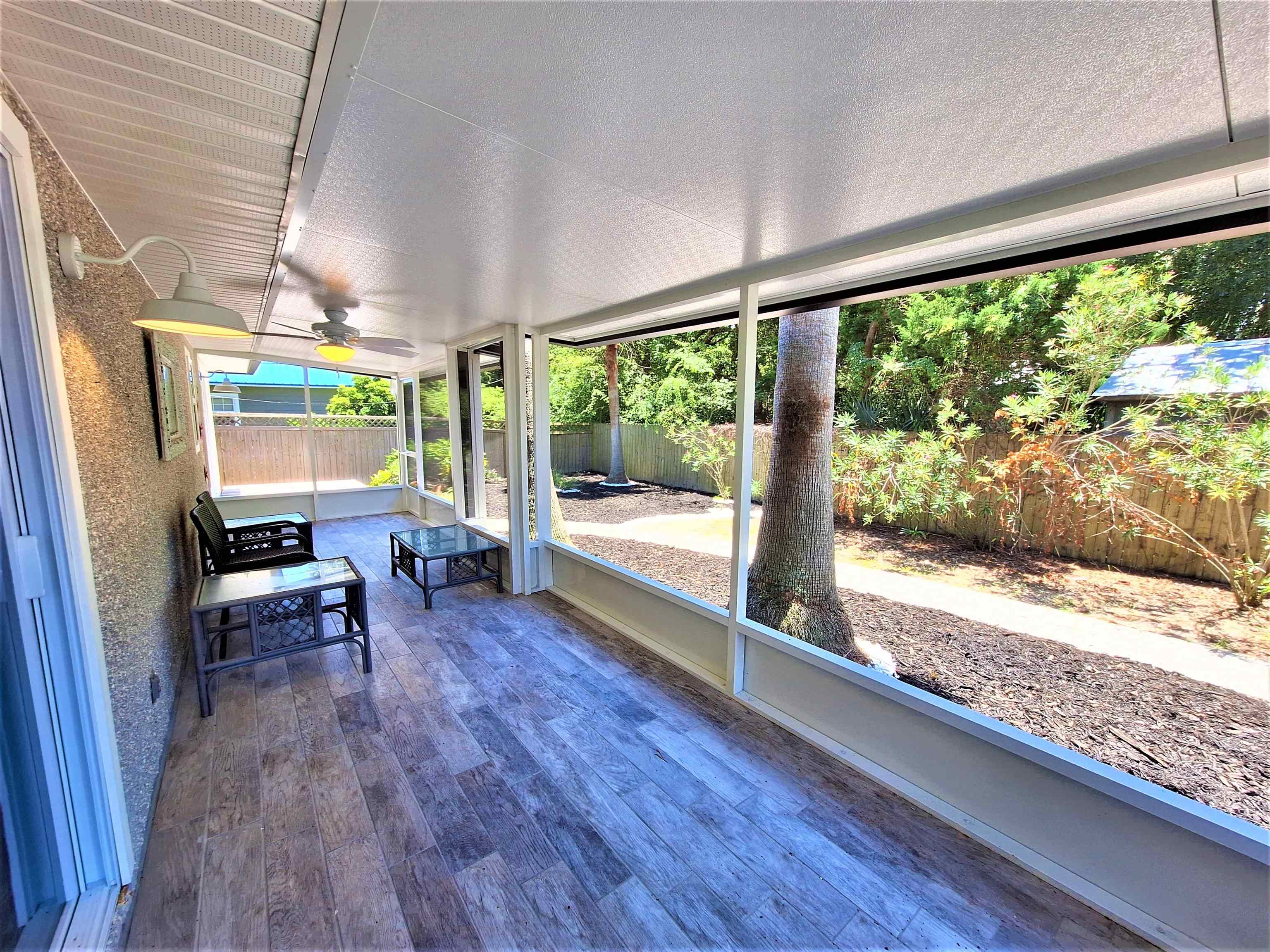 129 15th Street St. Augustine, FL 32080 - Photo 47 of 61 a view of a room with wooden floor and furniture