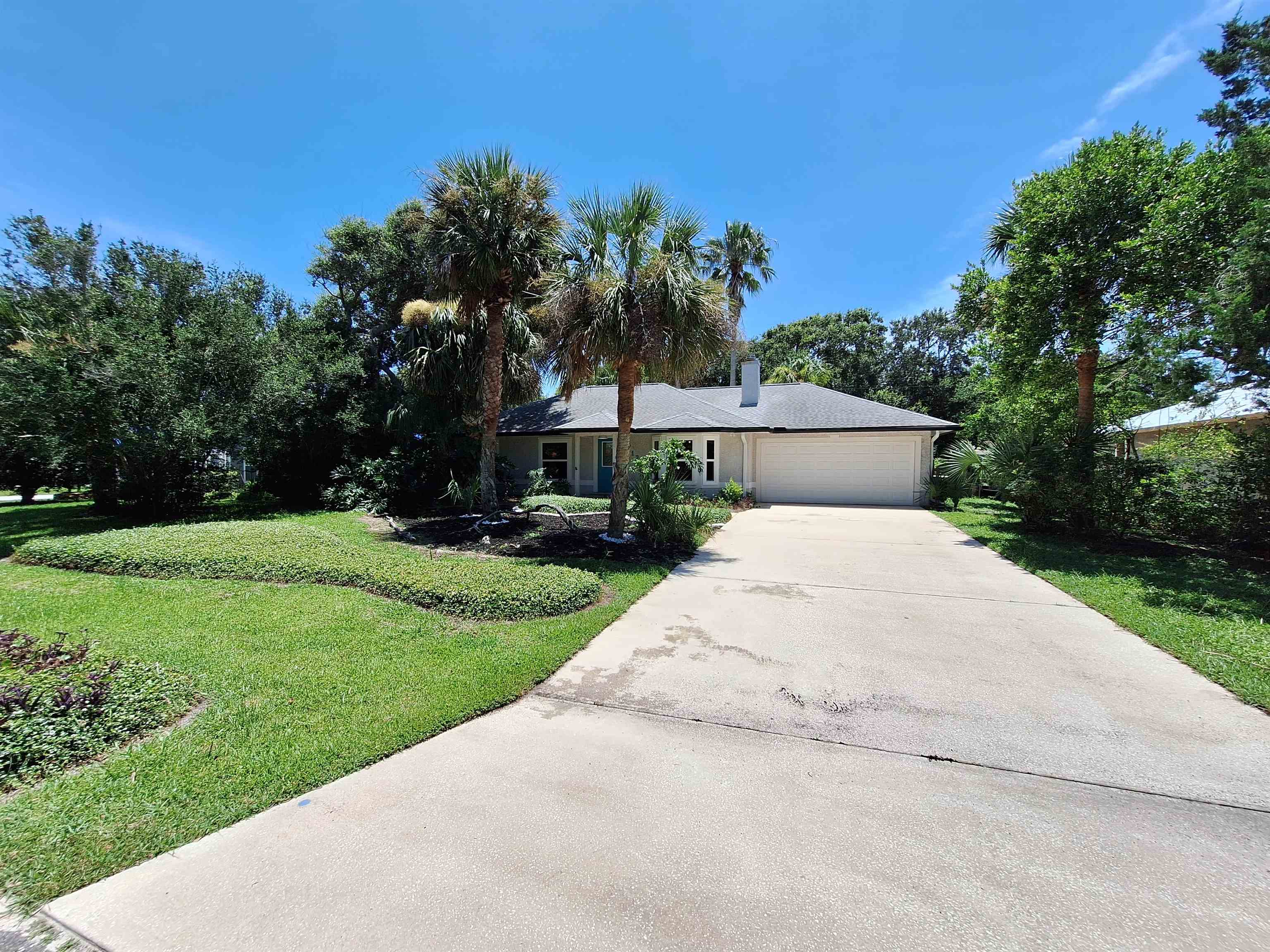 129 15th Street St. Augustine, FL 32080 - Photo 54 of 61 a view of a yard with palm trees