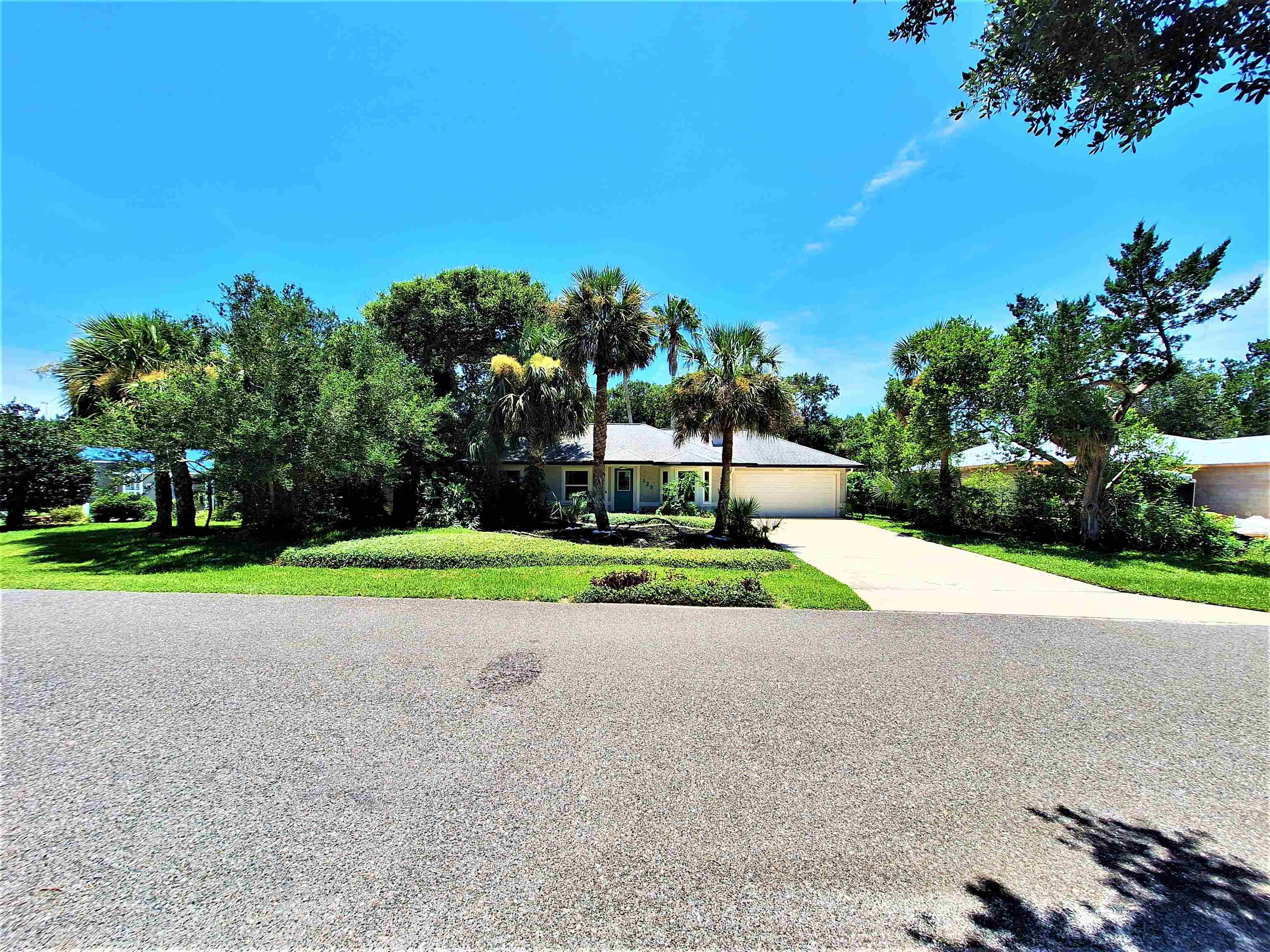 129 15th Street St. Augustine, FL 32080 - Photo 58 of 61 a view of road and trees