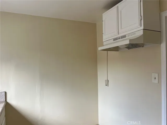 a view of room with cabinets