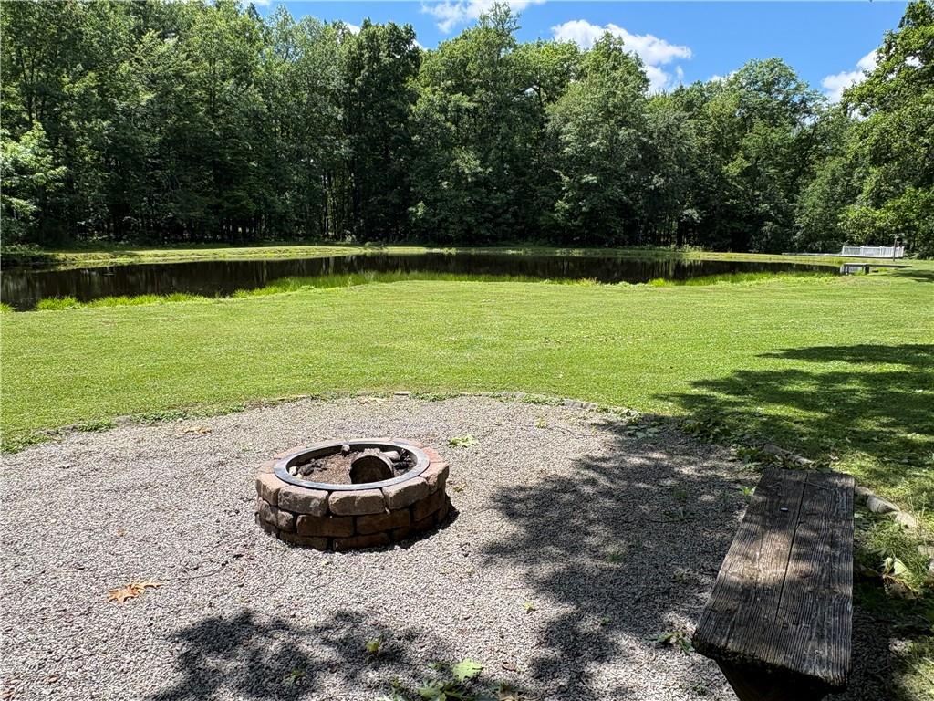 320 Cherry Hill Road Greenville, PA 16125 - Photo 3 of 38 a view of a swimming pool with a yard