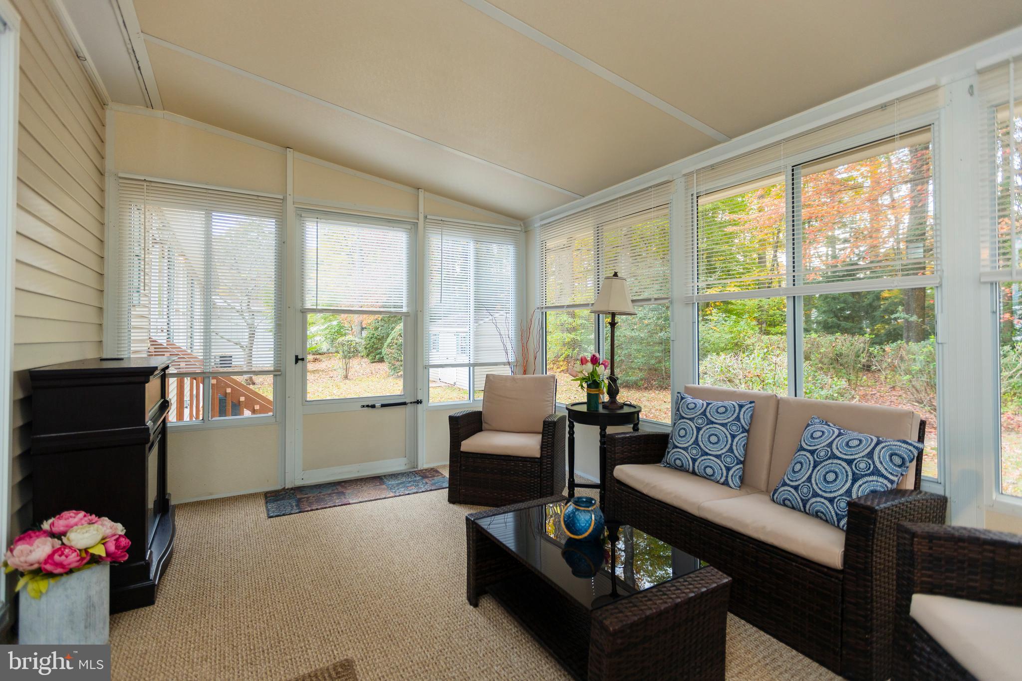 16 Cranberry Drive Cream Ridge, NJ 08514 - Photo 12 of 22 a living room with furniture and a large window