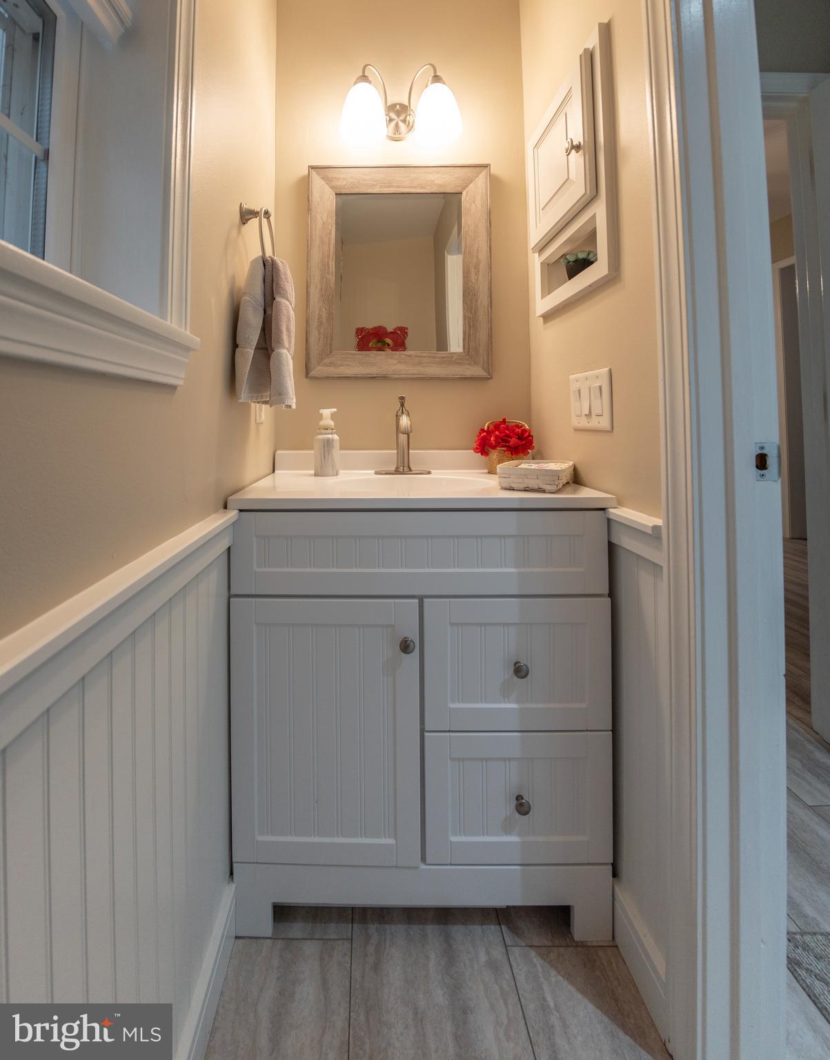 16 Cranberry Drive Cream Ridge, NJ 08514 - Photo 13 of 22 a bathroom with a sink vanity and mirror