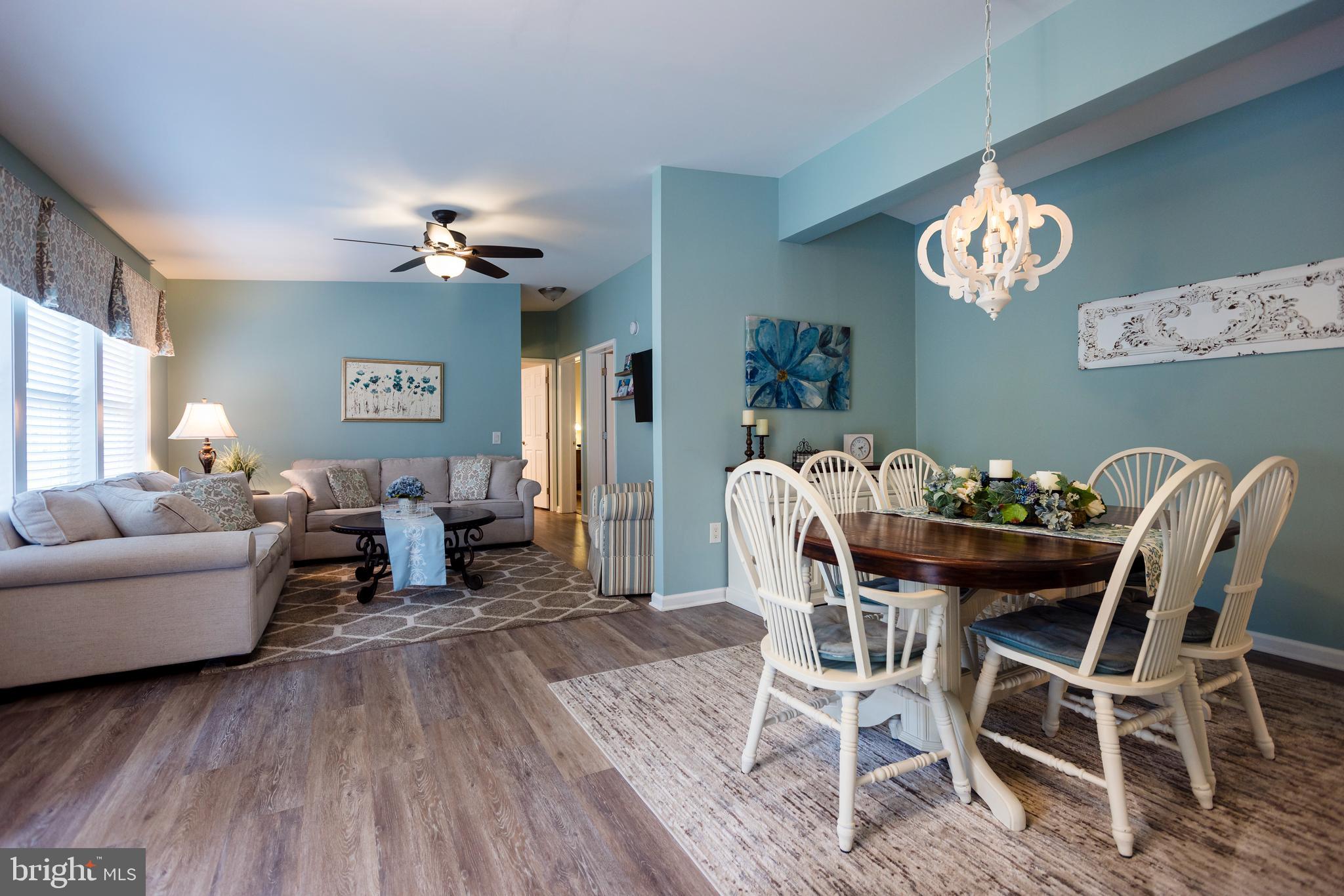 16 Cranberry Drive Cream Ridge, NJ 08514 - Photo 3 of 22 a living room with furniture dining table and a chandelier