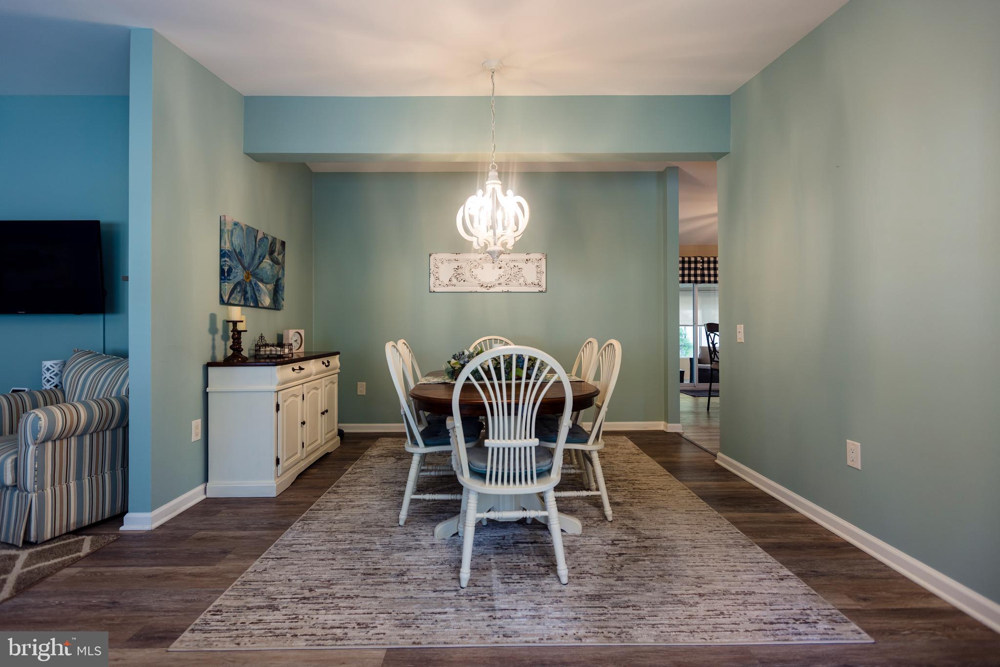 16 Cranberry Drive Cream Ridge, NJ 08514 - Photo 4 of 22 a dining room with furniture and wooden floor