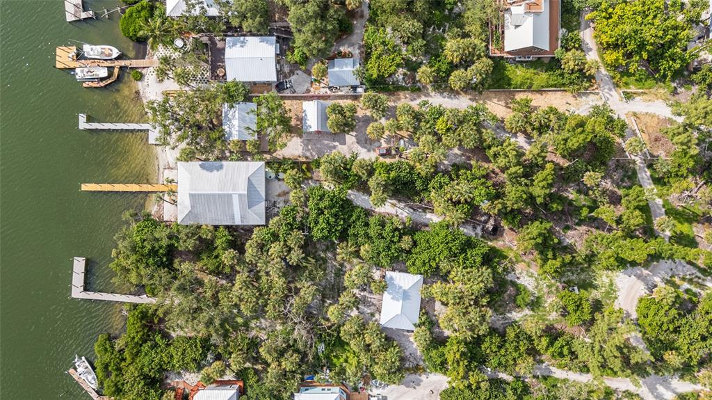 8178 Little Gasparilla Placida, FL 33946 - Photo 43 of 57 an aerial view of a house with a yard and garden