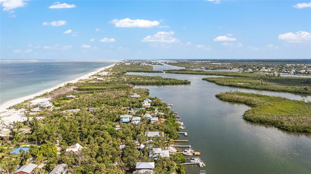 8178 Little Gasparilla Placida, FL 33946 - Photo 48 of 57 a view of lake view and mountain