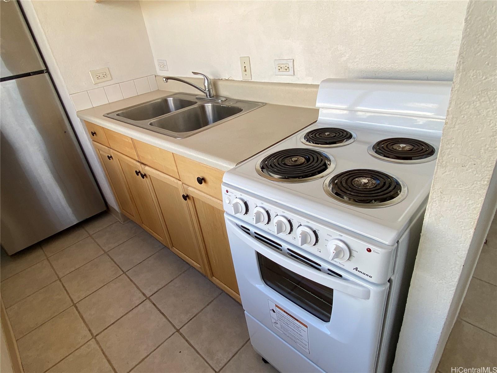 444 Niu Street, Unit 3407A Honolulu, HI 96815 - Photo 8 of 13 a utility room with dryer and washer