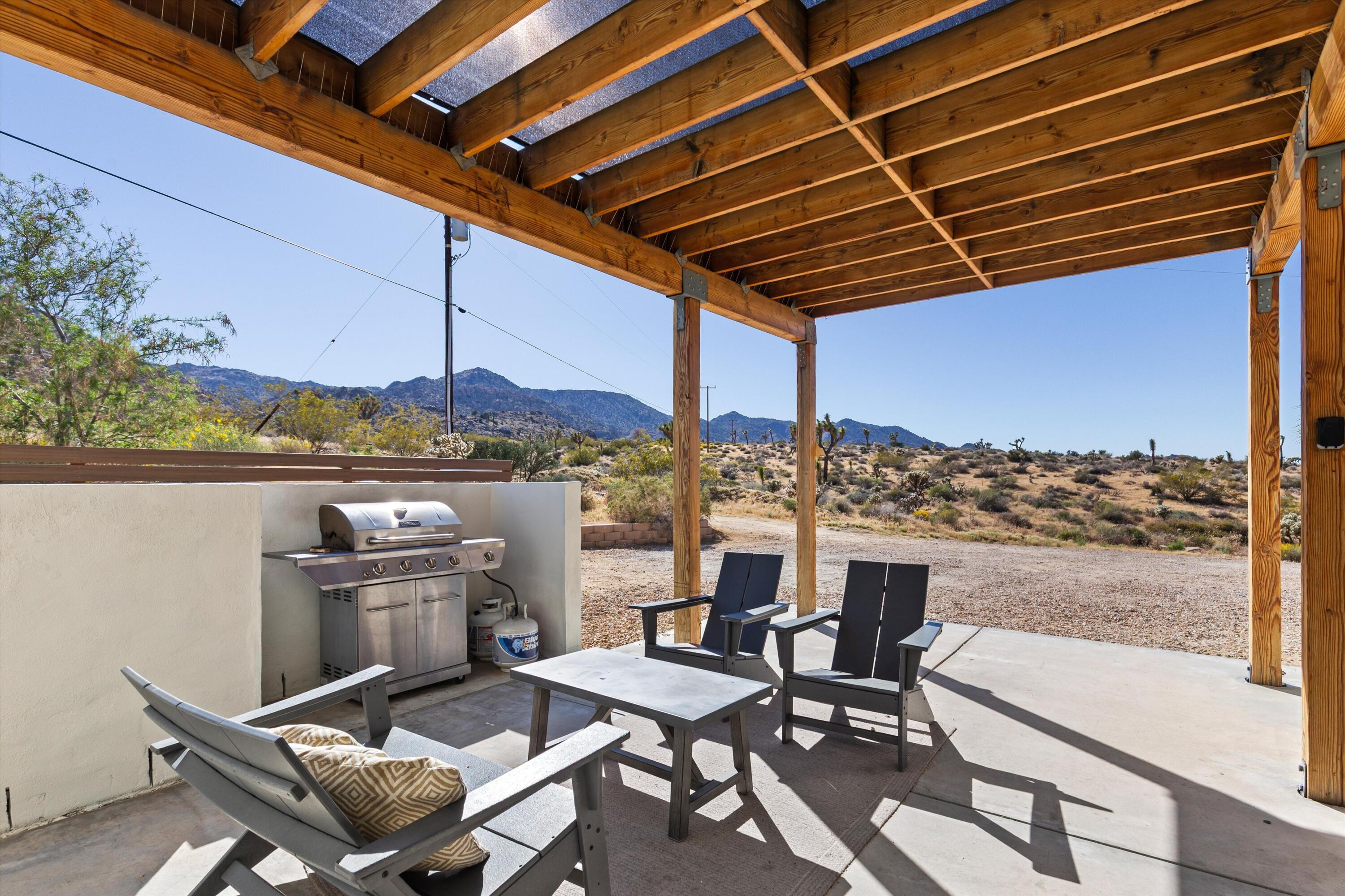 8825 Lilley Road Joshua Tree, CA 92252 - Photo 14 of 56 a view of a outdoor space with seating area