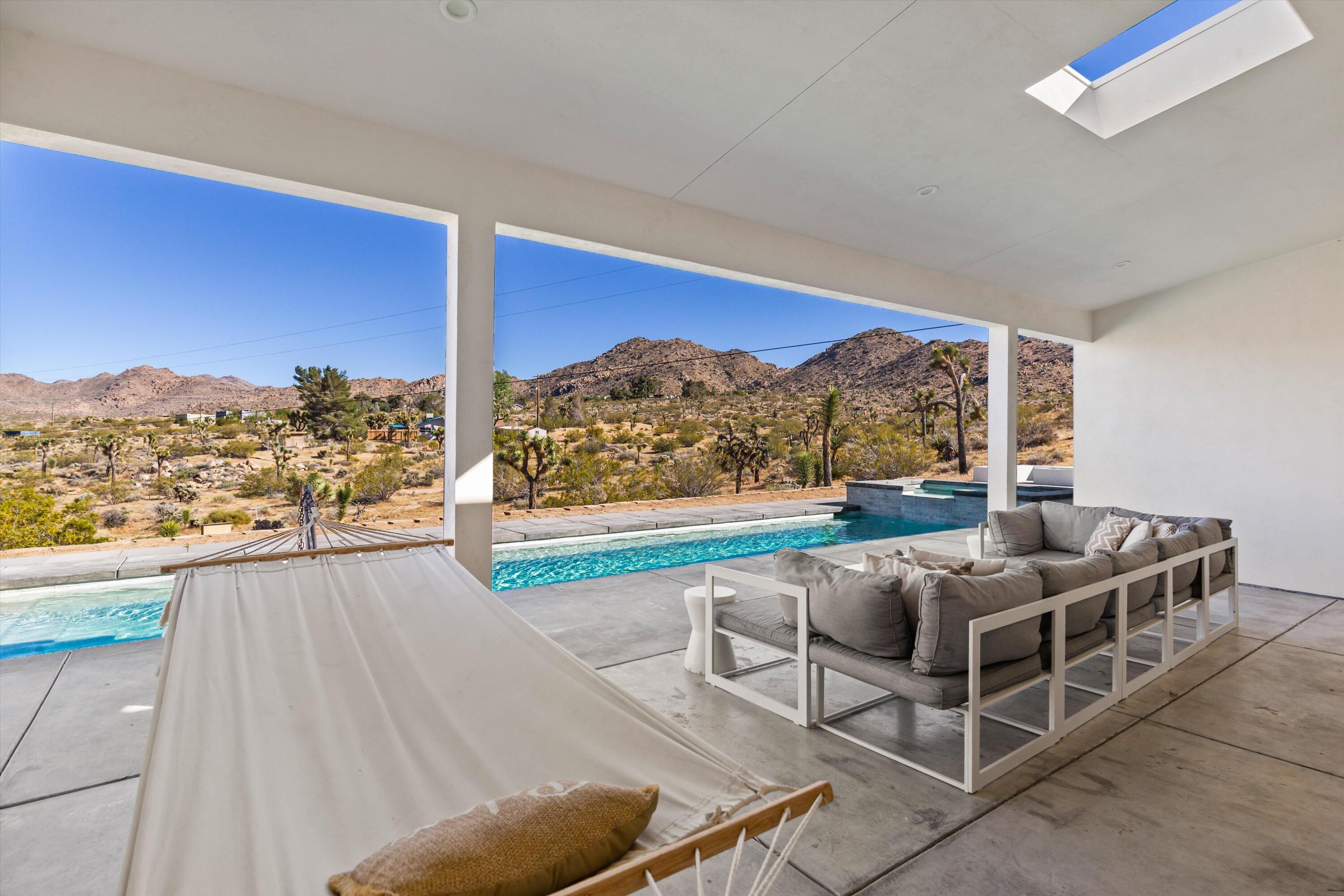 8825 Lilley Road Joshua Tree, CA 92252 - Photo 19 of 56 a living room with furniture